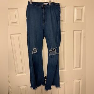 vibrant flair jeans with knee cut and distressed hem size 1X